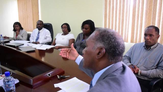 Premier of Nevis and Minister of Finance Hon. Vance Amory (extreme right), Permanent Secretary in the Ministry of Finance Colin Dore (second from right) and his staff at a meeting with a visiting team from the International Monetary Fund on April 25, 2016, at the Ministry of Finance conference room